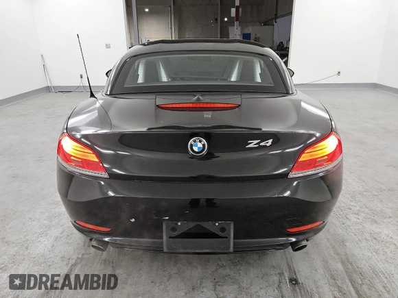 2012 BMW Z4 sDrive35i with VIN WBALM7C52CE385017, listed as a Copart auction lot 43223005 with 87,408 mi miles and Clean Title. Bid and sale history available at carsss.com. Image 6.
