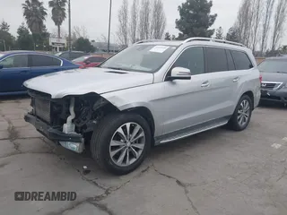 2016 Mercedes-Benz GL with VIN 4JGDF2EE1GA668972, listed as a IAAI auction lot 41432196 with 120,272 mi miles. Bid and sale history available at carsss.com. Image 2.