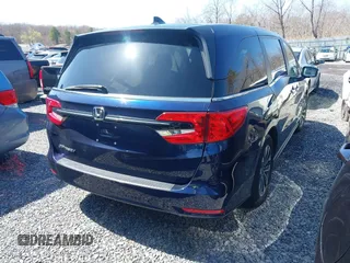 2022 Honda Odyssey EX-L with VIN 5FNRL6H7XNB061061, listed as a IAAI auction lot 41257019 with 52,194 mi miles and . Bid and sale history available at DreamBid. Image 4.