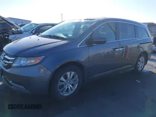 2014 Honda Odyssey EX-L with VIN 5FNRL5H61EB079739, listed as a IAAI auction lot 41659048 with 137,012 mi miles and . Bid and sale history available at carsss.com. Image 2.