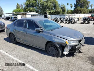 2014 Volkswagen Jetta SE with VIN 3VWD17AJ2EM322087, listed as a Copart auction lot 62571155 with 71,884 mi miles and Salvage title. Bid and sale history available at DreamBid. Image 4.