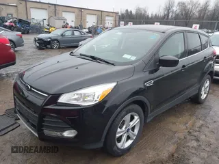 2014 Ford Escape SE with VIN 1FMCU9GX1EUC97297, listed as a IAAI auction lot 41983136 with 96,632 mi miles. Bid and sale history available at carsss.com. Image 2.