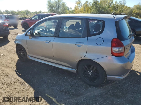 2007 Honda Fit Sport with VIN JHMGD38647S031956, listed as a Copart auction lot 73985754 with 138,233 mi miles and Salvage Title. Bid and sale history available at carsss.com. Image 2.
