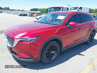 2016 Mazda CX-9 Touring with VIN JM3TCBCY5G0104504, listed as a IAAI auction lot 42314649 with 116,536 mi miles and . Bid and sale history available at DreamBid. Image 17.