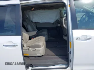 2011 Toyota Sienna XLE with VIN 5TDDK3DC6BS010355, listed as a IAAI auction lot 41998019 with 257,558 mi miles and . Bid and sale history available at DreamBid. Image 8.