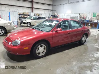 1999 Ford Taurus SE z VIN 1FAFP53U2XA272724, wystawiony jako Copart lot #42030425 z przebiegiem 89 712 mil mil oraz Szkoda całkowita • Salvage title. Historia ofert i sprzedaży dostępna na DreamBid. Obrazek 1.