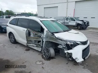 2021 Toyota Sienna XLE with VIN 5TDYRKECXMS048373, listed as a IAAI auction lot 41933814 with 484,197 mi miles and . Bid and sale history available at DreamBid. Image 1.