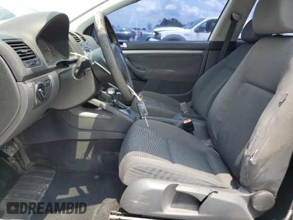 2009 Volkswagen Rabbit S с VIN WVWBA71KX9W048212, выставлен на аукционе Copart как лот 60592825 с пробегом 141 893 миль миль и Списание • Salvage title. История ставок и продаж доступна на DreamBid. Изображение 7.