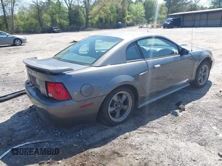 2003 Ford Mustang Standard z VIN 1FAFP40463F327753, wystawiony jako IAAI lot #42005257 z przebiegiem 325 449 mil mil oraz . Historia ofert i sprzedaży dostępna na DreamBid. Obrazek 4.