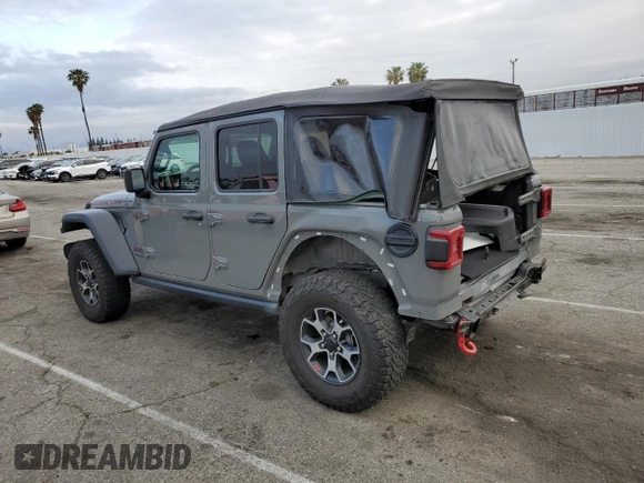 2022 Jeep Wrangler Unlimited Rubicon with VIN 1C4HJXFGXNW158038, listed as a Copart auction lot 53020575 with 14,355 mi miles and Salvage title. Bid and sale history available at DreamBid. Image 2.