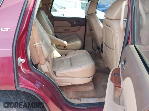 2007 GMC Yukon SLE with VIN 1GKFK13077J204048, listed as a IAAI auction lot 42052206 with 273,197 mi miles. Bid and sale history available at carsss.com. Image 8.