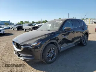 2021 Mazda CX-5 Touring z VIN JM3KFBCM3M0342752, wystawiony jako Copart lot #56930085 z przebiegiem 83 764 mil mil oraz Szkoda całkowita • Salvage title. Historia ofert i sprzedaży dostępna na DreamBid. Obrazek 1.