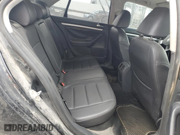 2009 Volkswagen Jetta SE with VIN 3VWRM71K49M172348, listed as a Copart auction lot 60603895 with 129,515 mi miles and Salvage title. Bid and sale history available at DreamBid. Image 10.