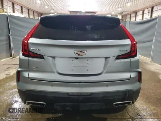 2024 Cadillac XT4 AWD Premium Luxury z VIN 1GYFZDR43RF148662, wystawiony jako Copart lot #65640385 z przebiegiem 38 267 mil mil oraz Czysty tytuł • Clean title. Historia ofert i sprzedaży dostępna na DreamBid. Obrazek 6.