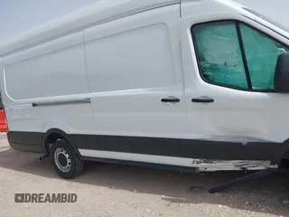 2023 Ford Transit Cargo z VIN 1FTBR3X83PKA69906, wystawiony jako IAAI lot #41755937 z przebiegiem 35 484 mil mil oraz . Historia ofert i sprzedaży dostępna na DreamBid. Obrazek 13.