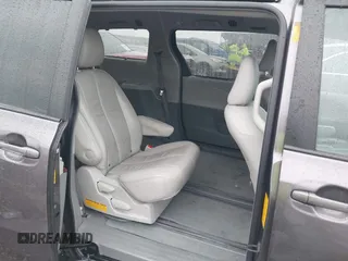 2014 Toyota Sienna XLE with VIN 5TDYK3DC0ES502482, listed as a IAAI auction lot 41910683 with 151,330 mi miles. Bid and sale history available at carsss.com. Image 8.