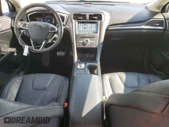 2017 Ford Fusion Titanium с VIN 3FA6P0K96HR161679, выставлен на аукционе Copart как лот 61237935 с пробегом 66 680 миль миль и Списание • Salvage title. История ставок и продаж доступна на DreamBid. Изображение 8.