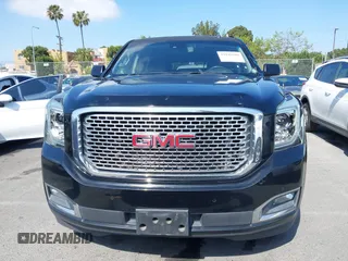 2015 GMC Yukon XL Denali with VIN 1GKS1JKJ1FR134428, listed as a IAAI auction lot 42149588 with 116,207 mi miles. Bid and sale history available at carsss.com. Image 12.