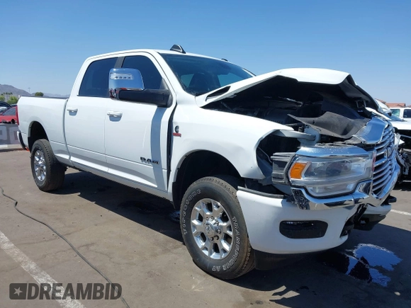 2023 Ram 2500 Laramie with VIN 3C6UR5FL2PG559276, listed as a IAAI auction lot 42281324 with 23,526 mi miles and . Bid and sale history available at DreamBid. Image 1.