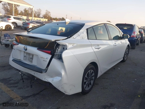 2022 Toyota Prius L Eco with VIN JTDKAMFU1N3181302, listed as a IAAI auction lot 41412650 with 92,397 mi miles. Bid and sale history available at carsss.com. Image 4.