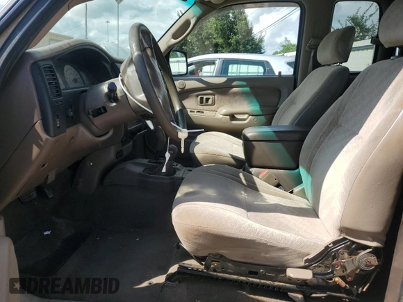 2003 Toyota Tacoma with VIN 5TEWN72N23Z249417, listed as a Copart auction lot 64507655 with 207,428 mi miles and Clean title. Bid and sale history available at DreamBid. Image 7.