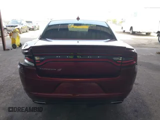 2019 Dodge Charger SXT with VIN 2C3CDXJG0KH757909, listed as a IAAI auction lot 41597907 with 71,882 mi miles and . Bid and sale history available at DreamBid. Image 16.