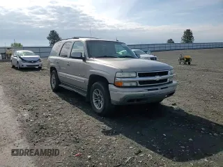 2003 Chevrolet Tahoe LT z VIN 1GNEK13ZX3J174096, wystawiony jako Copart lot #58269055 z przebiegiem 260 832 mil mil oraz Szkoda całkowita • Salvage title. Historia ofert i sprzedaży dostępna na DreamBid. Obrazek 14.