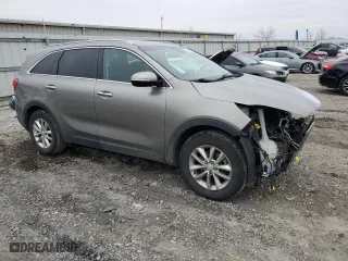 2016 Kia Sorento LX with VIN 5XYPG4A59GG183592, listed as a Copart auction lot 42480615 with 184,205 mi miles and Salvage Title. Bid and sale history available at carsss.com. Image 4.