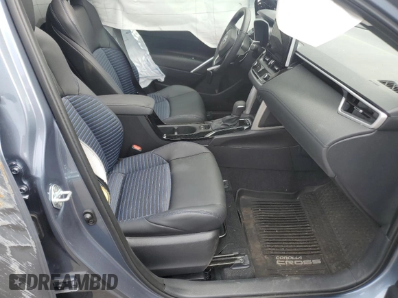 2024 Toyota Corolla Cross Hybrid S with VIN 7MUFBABG0RV053138, listed as a Copart auction lot 59515915 with 7,065 mi miles and Salvage title. Bid and sale history available at DreamBid. Image 7.