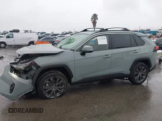 2023 Toyota RAV4 Hybrid XLE Premium with VIN JTMB6RFVXPD104349, listed as a IAAI auction lot 41730288 with 30,904 mi miles. Bid and sale history available at carsss.com. Image 14.