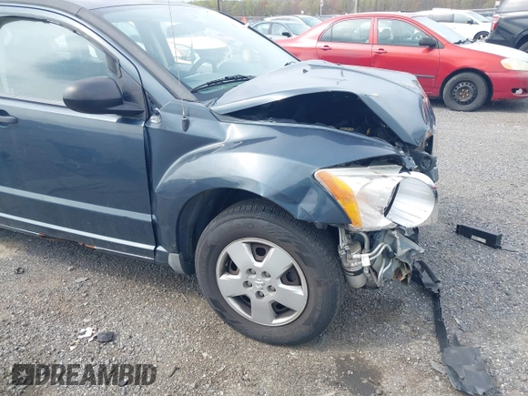 2007 Dodge Caliber with VIN 1B3HB28B17D350160, listed as a IAAI auction lot 41988479 with 174,949 mi miles. Bid and sale history available at carsss.com. Image 6.
