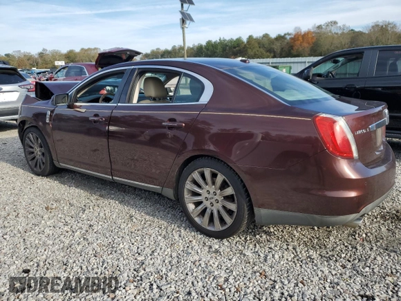 2012 Lincoln MKS with VIN 1LNHL9ERXCG801273, listed as a Copart auction lot 82476574 with 203,370 mi miles and Salvage Title. Bid and sale history available at DreamBid. Image 2.