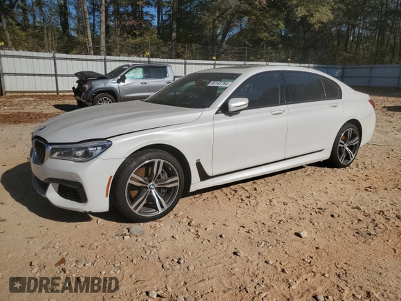 2016 BMW 7 Series 750i with VIN WBA7F0C58GGM20723, listed as a Copart auction lot 80143764 with 102,311 mi miles and Salvage Title. Bid and sale history available at carsss.com. Image 1.
