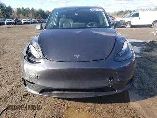 2023 Tesla Model Y Long Range z VIN 7SAYGAEE3PF596826, wystawiony jako Copart lot #50513045 z przebiegiem 30 747 mil mil oraz Szkoda całkowita • Salvage title. Historia ofert i sprzedaży dostępna na DreamBid. Obrazek 5.