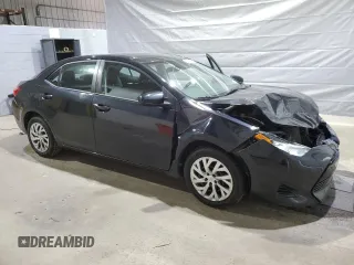 2019 Toyota Corolla L with VIN 2T1BURHE5KC185821, listed as a Copart auction lot 52613985 with 104,208 mi miles and Salvage title. Bid and sale history available at DreamBid. Image 4.