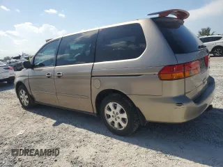 2004 Honda Odyssey EX-RES z VIN 5FNRL18814B125773, wystawiony jako Copart lot #58205565 z przebiegiem 250 732 mil mil oraz Szkoda całkowita • Salvage title. Historia ofert i sprzedaży dostępna na DreamBid. Obrazek 2.