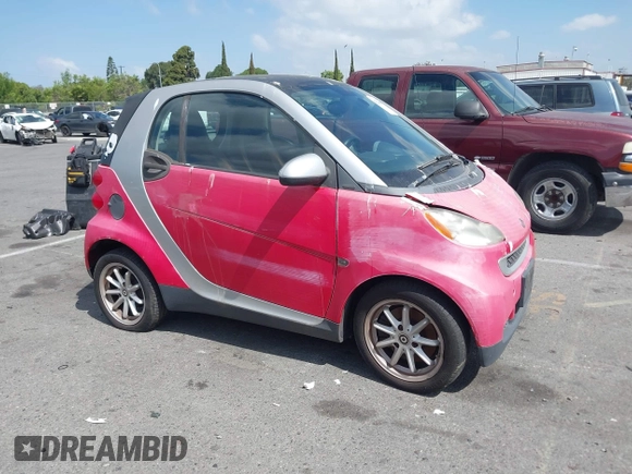 2009 Smart fortwo Pure z VIN WMEEJ31X59K245895, wystawiony jako IAAI lot #42266793 z przebiegiem 120 497 mil mil oraz . Historia ofert i sprzedaży dostępna na DreamBid. Obrazek 1.