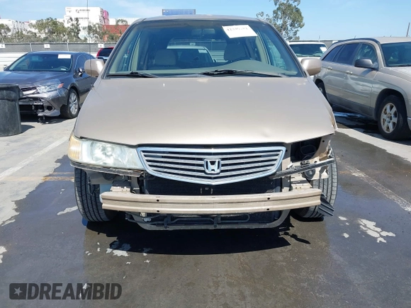 2001 Honda Odyssey EX z VIN 2HKRL18611H553161, wystawiony jako IAAI lot #42339181 z przebiegiem 89 235 mil mil oraz . Historia ofert i sprzedaży dostępna na DreamBid. Obrazek 6.