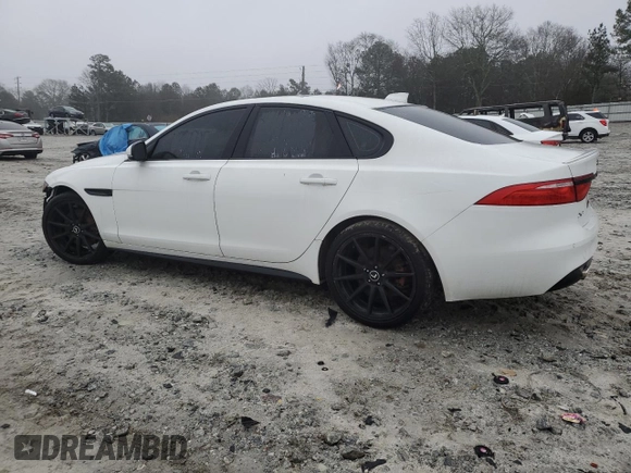2016 Jaguar XF S with VIN SAJBG4BV6GCY17651, listed as a Copart auction lot 82511083 with 117,677 mi miles. Bid and sale history available at carsss.com. Image 2.