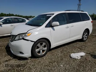 2014 Toyota Sienna LE AAS with VIN 5TDKK3DC6ES497746, listed as a Copart auction lot 56125845 with 142,596 mi miles and Salvage Title. Bid and sale history available at DreamBid. Image 1.