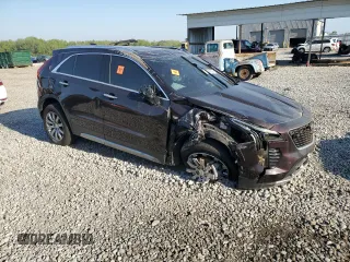 2021 Cadillac XT4 FWD Premium Luxury z VIN 1GYFZCR45MF002654, wystawiony jako Copart lot #52288105 z przebiegiem Nie podano mil oraz Szkody całkowita. Historia ofert i sprzedaży dostępna na DreamBid. Obrazek 4.