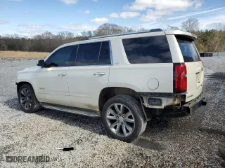 2015 Chevrolet Tahoe LTZ with VIN 1GNSCCKC9FR143064, listed as a Copart auction lot 45360745 with 140,751 mi miles and Salvage Title. Bid and sale history available at carsss.com. Image 2.