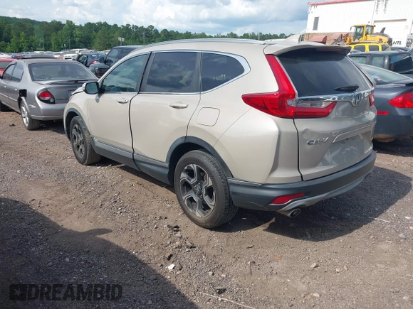 2018 Honda CR-V Touring with VIN 5J6RW2H96JL000910, listed as a IAAI auction lot 42490580 with 201,534 mi miles and . Bid and sale history available at DreamBid. Image 3.