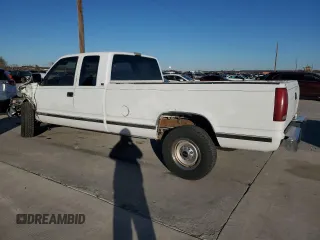 1991 GMC Sierra 1500 with VIN 2GTGC29K3M1532424, listed as a Copart auction lot 86216144 with 173,257 mi miles and Salvage Title. Bid and sale history available at DreamBid. Image 2.