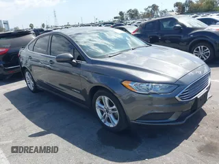 2018 Ford Fusion Hybrid SE with VIN 3FA6P0LU4JR261594, listed as a IAAI auction lot 40360797 with 128,533 mi miles. Bid and sale history available at carsss.com. Image 1.