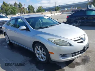 2013 Mazda 6 i Touring Plus z VIN 1YVHZ8EH7D5M09119, wystawiony jako IAAI lot #42376782 z przebiegiem 197 555 mil mil oraz . Historia ofert i sprzedaży dostępna na DreamBid. Obrazek 1.