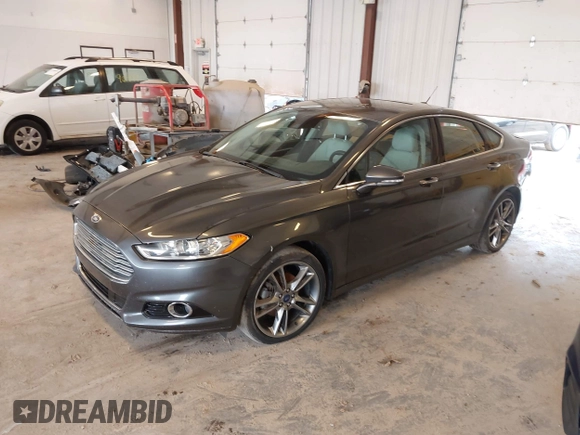 2016 Ford Fusion Titanium with VIN 3FA6P0D9XGR223354, listed as a IAAI auction lot 42621924 with Not provided miles and . Bid and sale history available at DreamBid. Image 2.