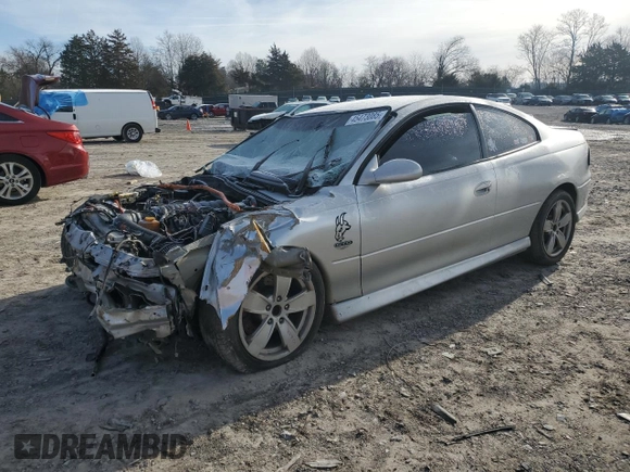 2005 Pontiac GTO z VIN 6G2VX12UX5L381201, wystawiony jako Copart lot #45473085 z przebiegiem 148 787 mil mil oraz Szkoda całkowita • Salvage title. Historia ofert i sprzedaży dostępna na DreamBid. Obrazek 1.