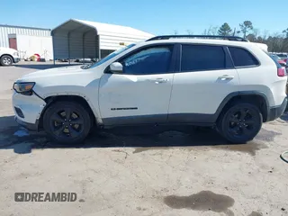 2019 Jeep Cherokee Latitude Plus with VIN 1C4PJLLB2KD296144, listed as a IAAI auction lot 41681051 with 199,698 mi miles and . Bid and sale history available at DreamBid. Image 14.