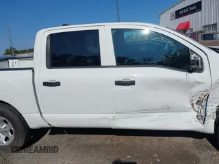 2023 Nissan Titan SV with VIN 1N6AA1EC1PN114674, listed as a IAAI auction lot 42141106 with 18,271 mi miles and . Bid and sale history available at DreamBid. Image 13.